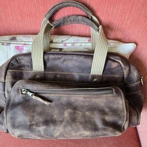 Brown and Tan Duffel Bag with Distressed Leather and Adjustable Straps